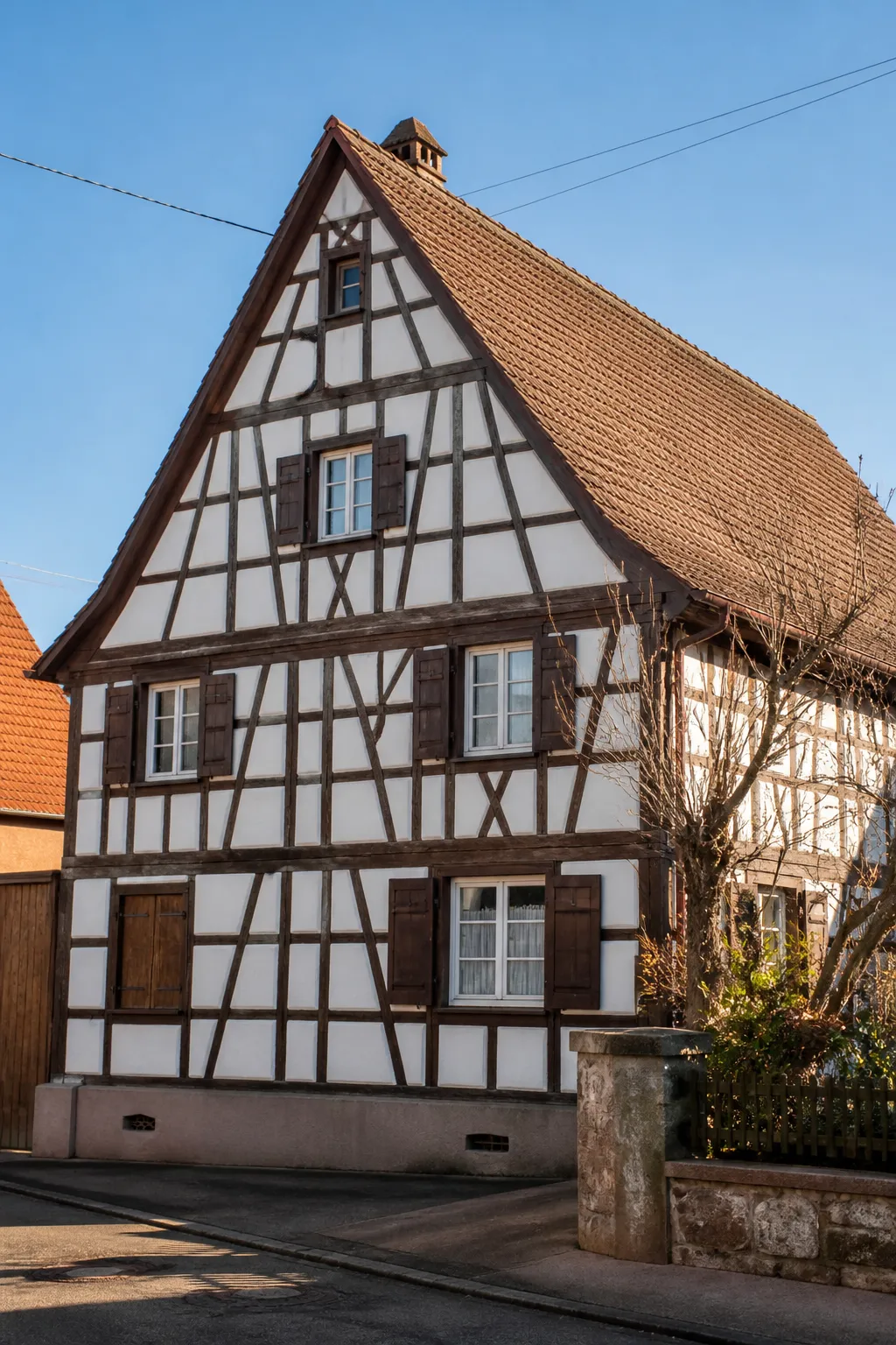 Maison alsacienne à pans de bois examinée avant un achat dans le Bas-Rhin