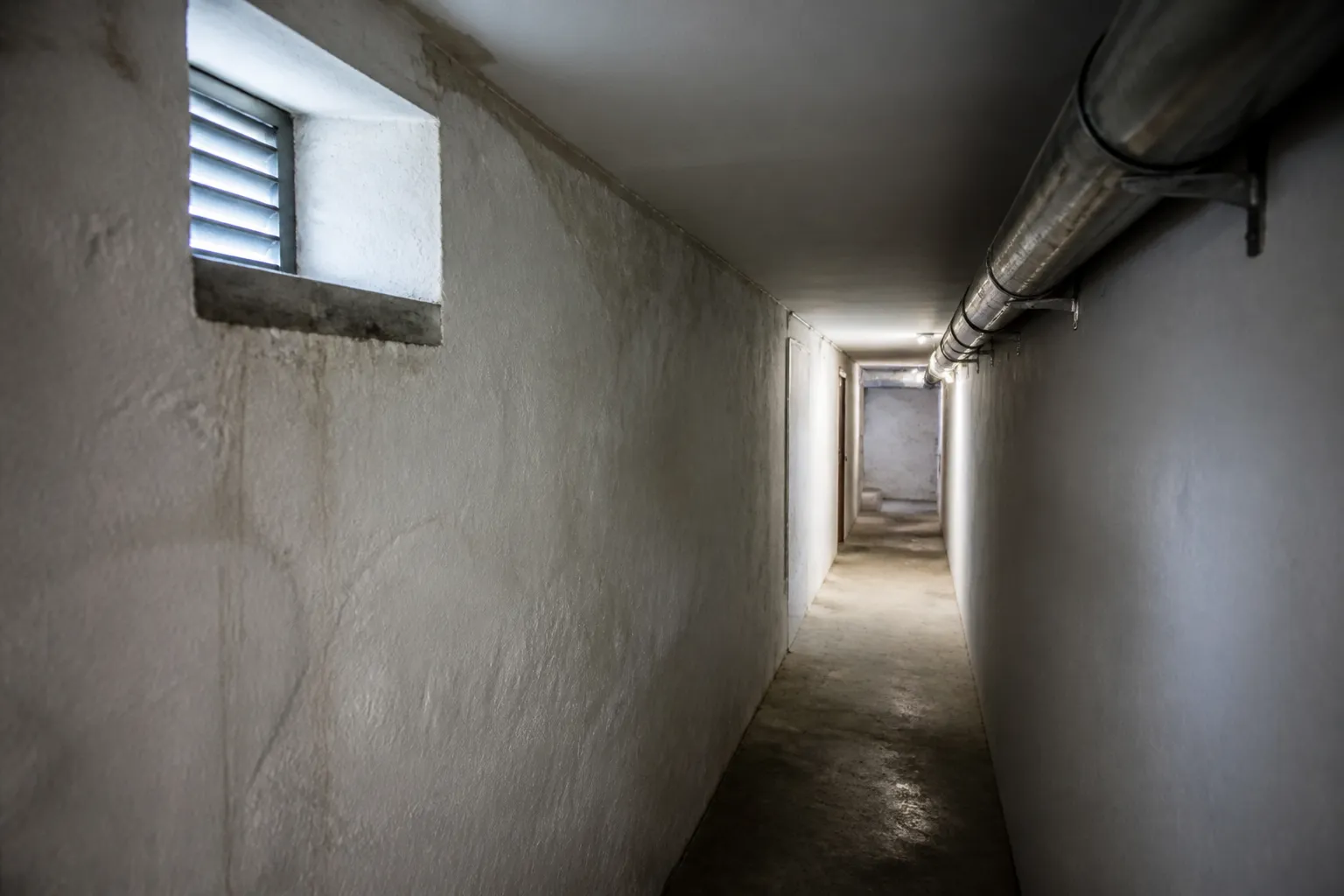 Cave d'immeuble ventilée examinée lors d'une expertise